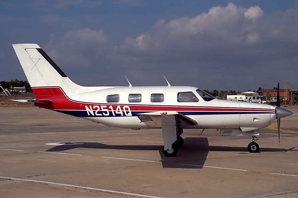 A small airplane sitting on top of an airport runway.